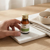 Application de l'huile de Sidr Hemani - Soin cheveux et barbe