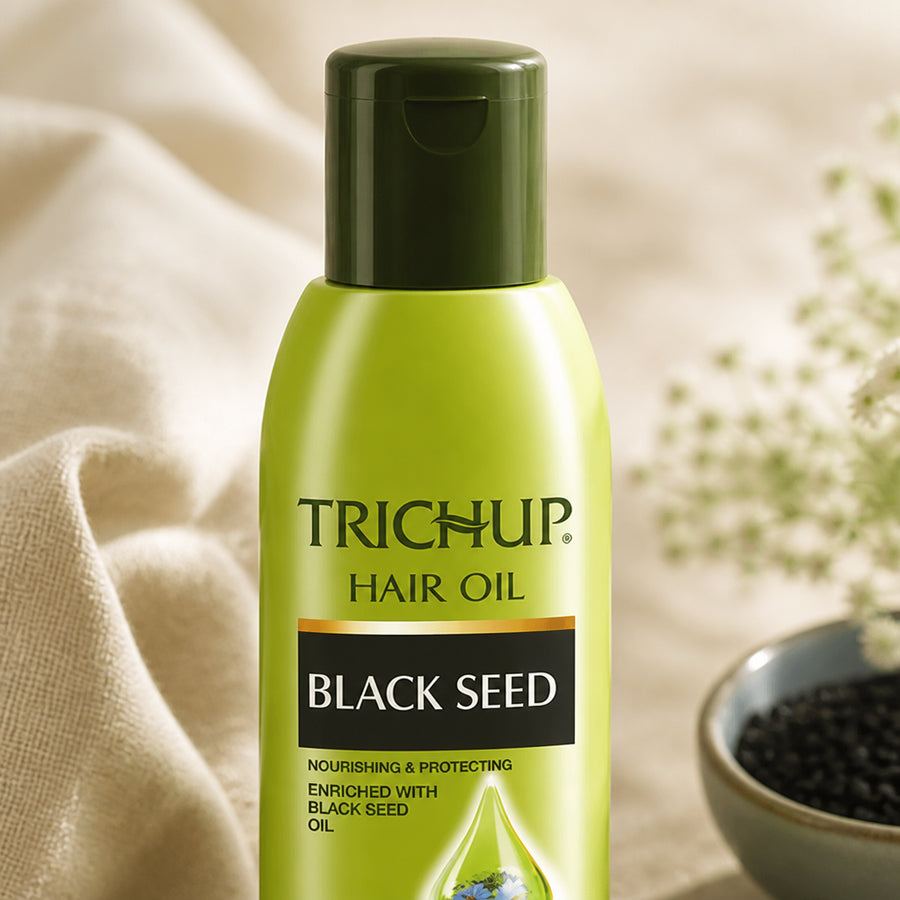 Huile capillaire à la Graine de Nigelle Trichup 200 mL — gros plan texture bouchon et étiquette supérieure