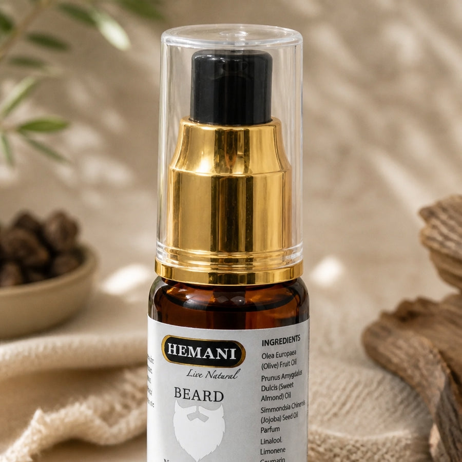Huile à Barbe senteur oud Hemani — gros plan texture capuchon et étiquette supérieure