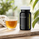 Gélules de séné Natureluxy avec tisane détox sur table en bois – Cassia angustifolia format éco 600 gélules
