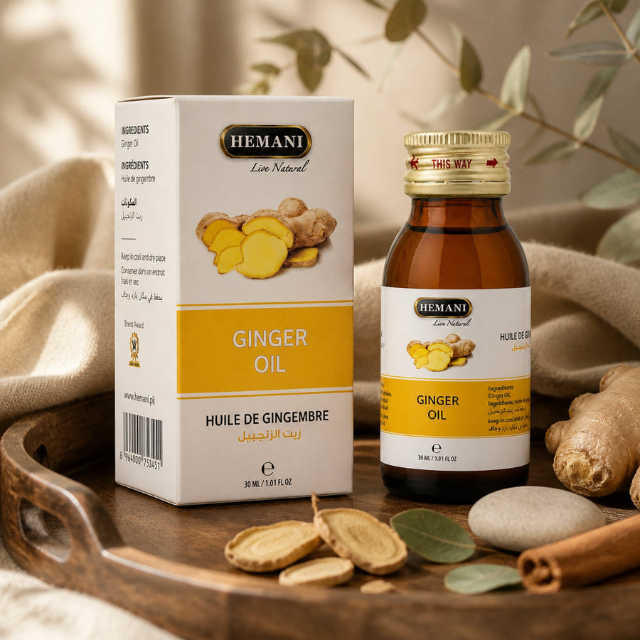Huile de Gingembre 30mL 100% Naturelle Hemani - ambiance lifestyle éditoriale plateau noyer et lin, packaging d'origine préservé