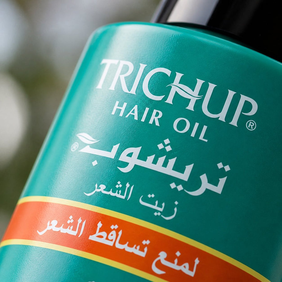 2 Huile Anti-Chute Soin Indien Trichup 50mL -5% – gros plan sur la texture et la matière