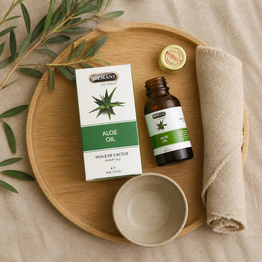 2 Huile de Cactus 30ml 100% Naturelle Hemani – rituel d'utilisation vu du dessus, ambiance naturelle zen