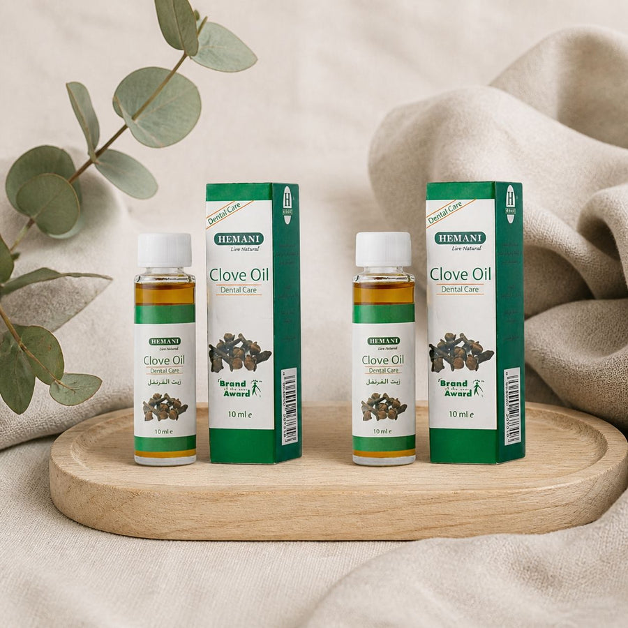2 Huiles de Girofle 10mL Hemani – composition sur plateau en bois