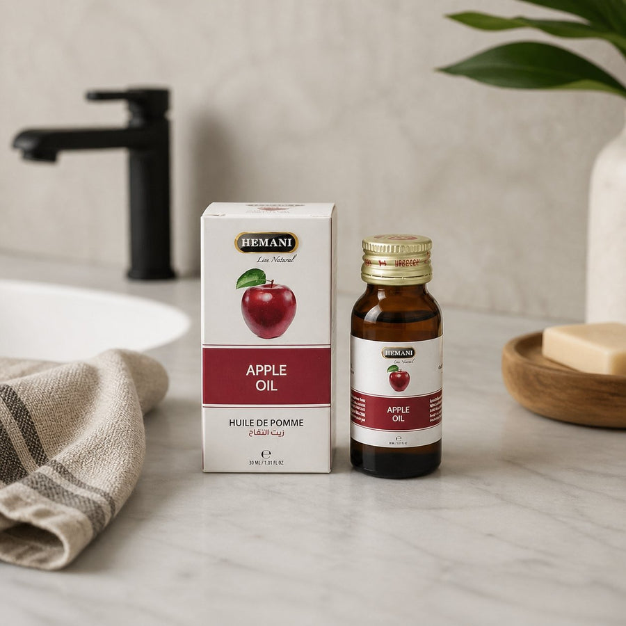 2 Huile de Pomme 30mL 100% Naturelle Hemani – présentation du produit dans une salle de bain lumineuse et naturelle