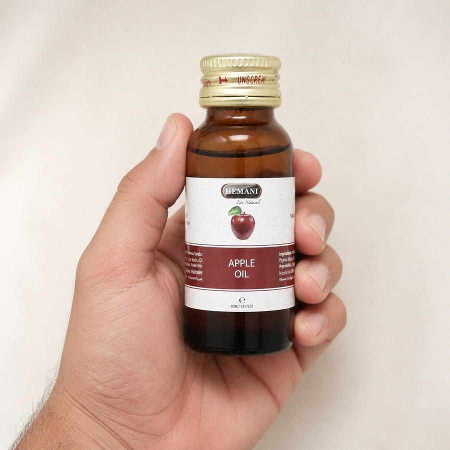 2 Huile de Pomme 30mL 100% Naturelle Hemani – taille et contenance réelles du produit en main