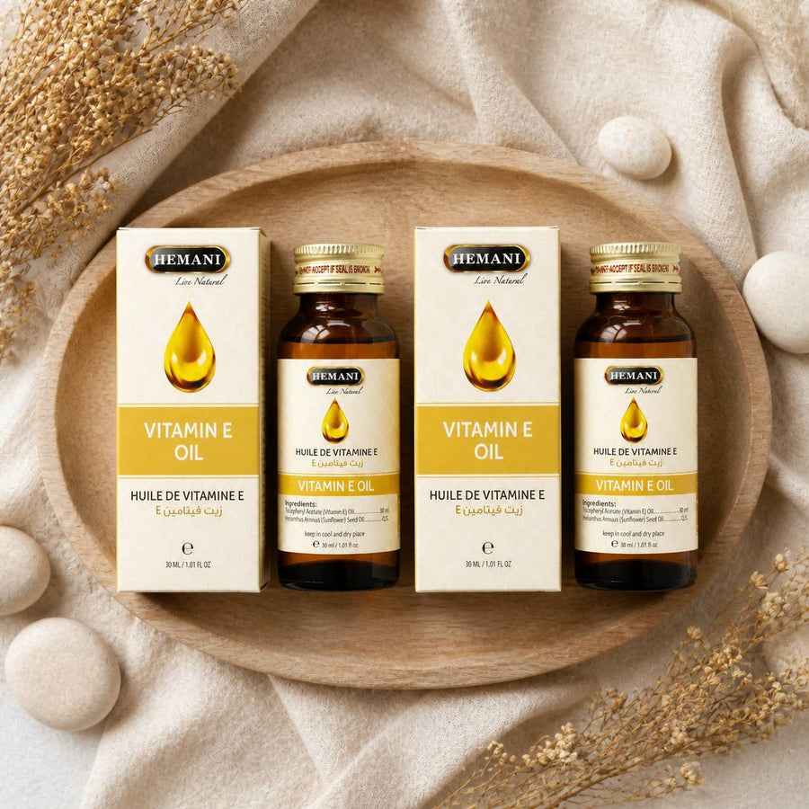2 Huile de Vitamine E 30mL 100% Naturelle Hemani – composition flat lay avec éléments naturels, vue du dessus
