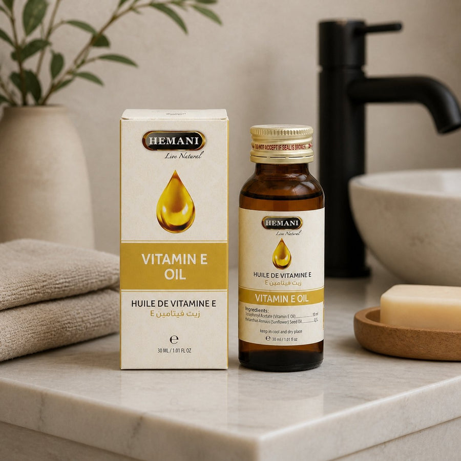 2 Huile de Vitamine E 30mL 100% Naturelle Hemani – présentation du produit dans une salle de bain lumineuse et naturelle