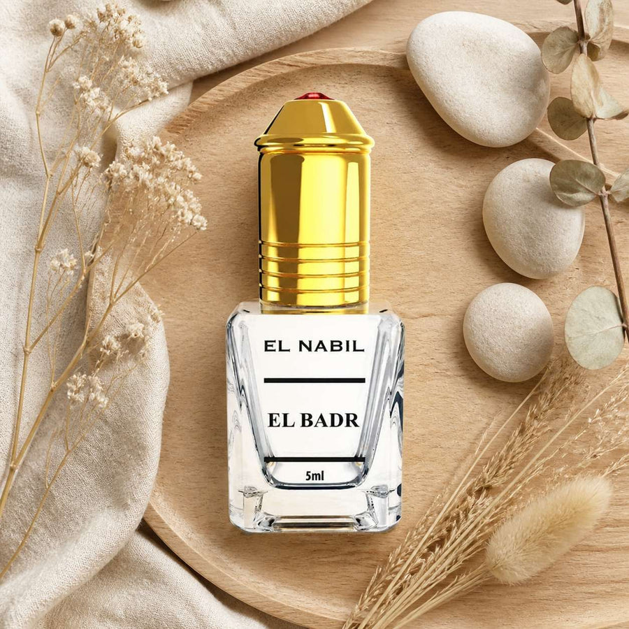 2X Musc El Badr applicateur Roll-On - 5mL – composition flat lay avec éléments naturels, vue du dessus