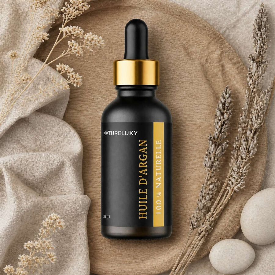 3 Huile d'Argan 30mL Pipette 100% naturelle – composition flat lay avec éléments naturels, vue du dessus