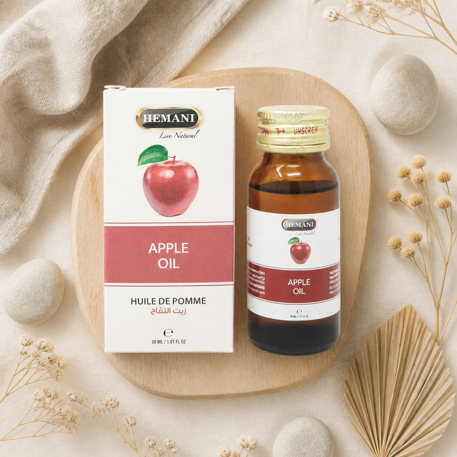3 Huile de Pomme 30mL 100% Naturelle Hemani – composition flat lay avec éléments naturels, vue du dessus