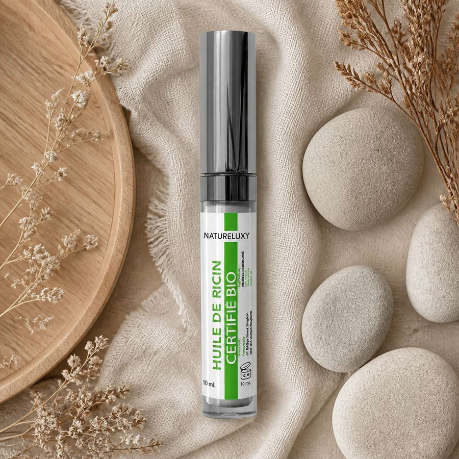 3 Huile de ricin en mascara pour faire pousser les cils 10ml – composition flat lay avec éléments naturels, vue du dessus