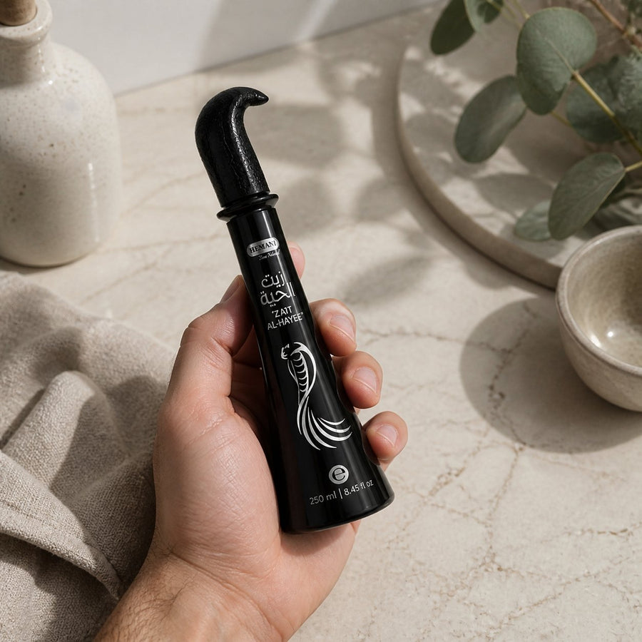 3 Huiles de Serpent pour cheveux Zait Al Hayee - Hemani - 250 ml – application en situation réelle, geste de soin quotidien