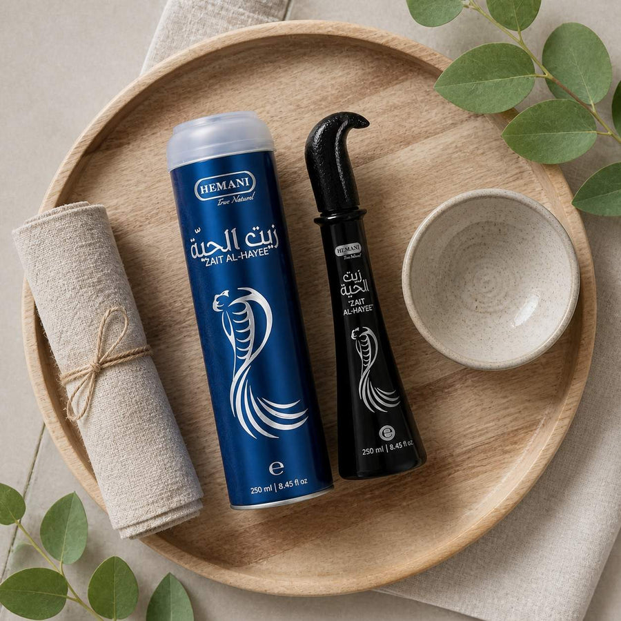 3 Huiles de Serpent pour cheveux Zait Al Hayee - Hemani - 250 ml – rituel d'utilisation vu du dessus, ambiance naturelle zen