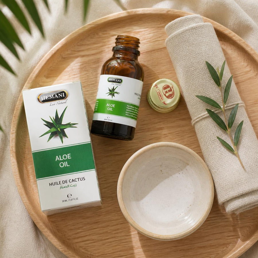 3 Huile de Cactus 30ml 100% Naturelle Hemani – rituel d'utilisation vu du dessus, ambiance naturelle zen