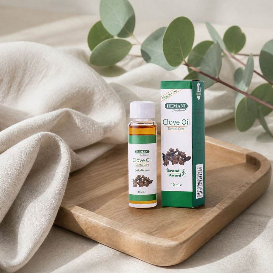 5 Huile de Girofle 10mL Hemani – composition sur plateau en bois
