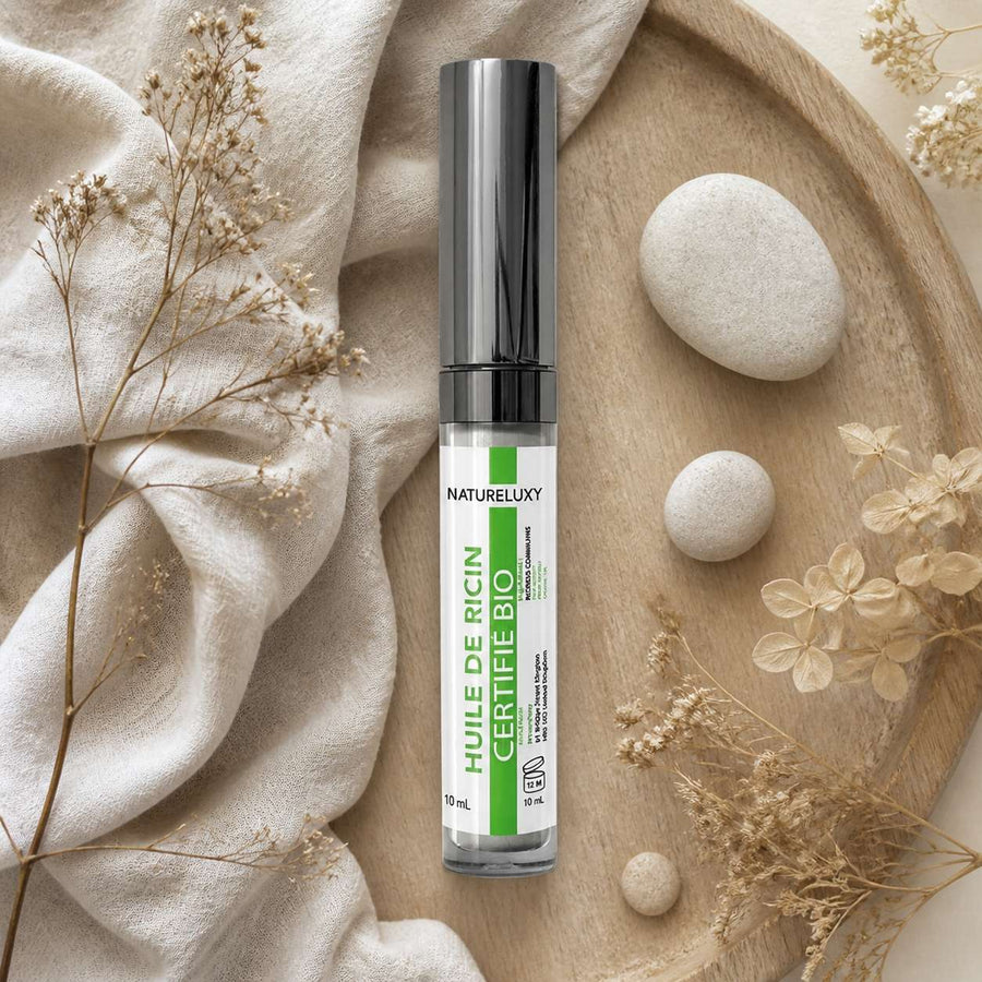 5 Huile de ricin en mascara pour faire pousser les cils - 10 ml – composition flat lay avec éléments naturels, vue du dessus