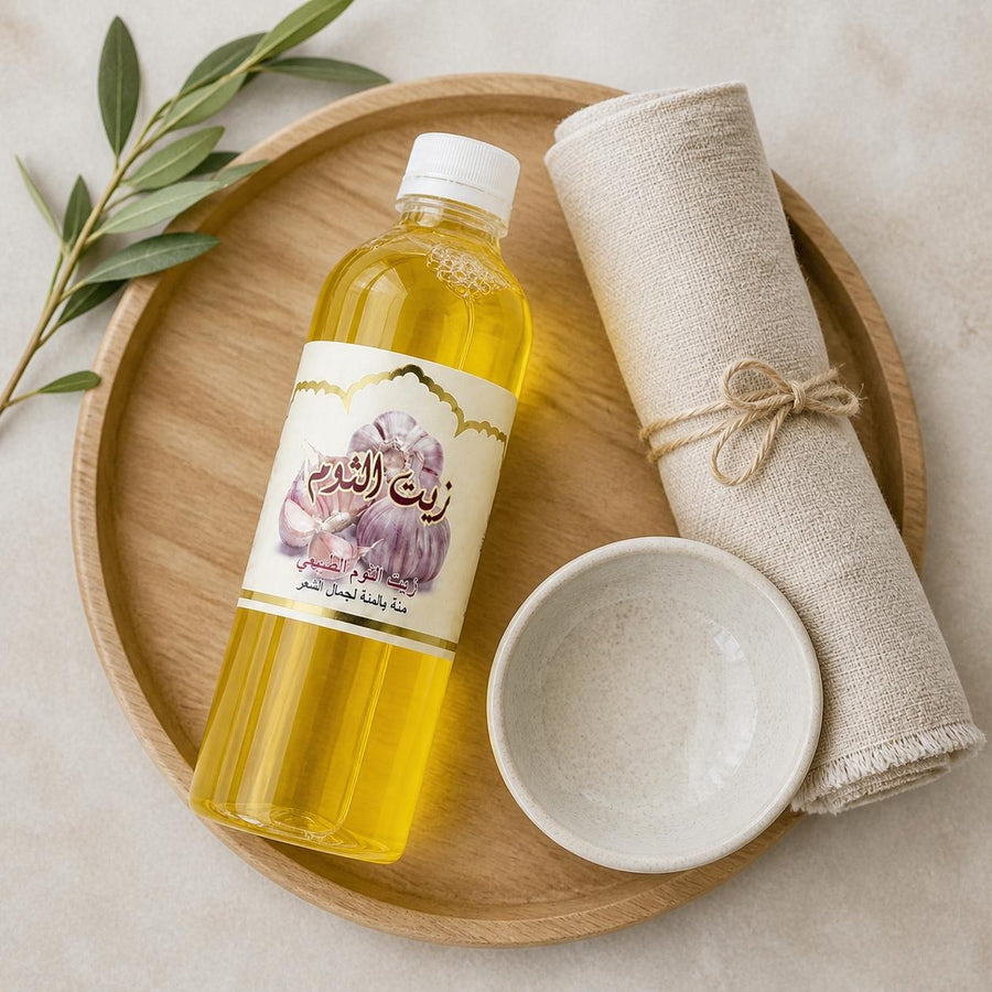 5X1L Huile d'Ail Cosmétique – rituel d'utilisation vu du dessus, ambiance naturelle zen