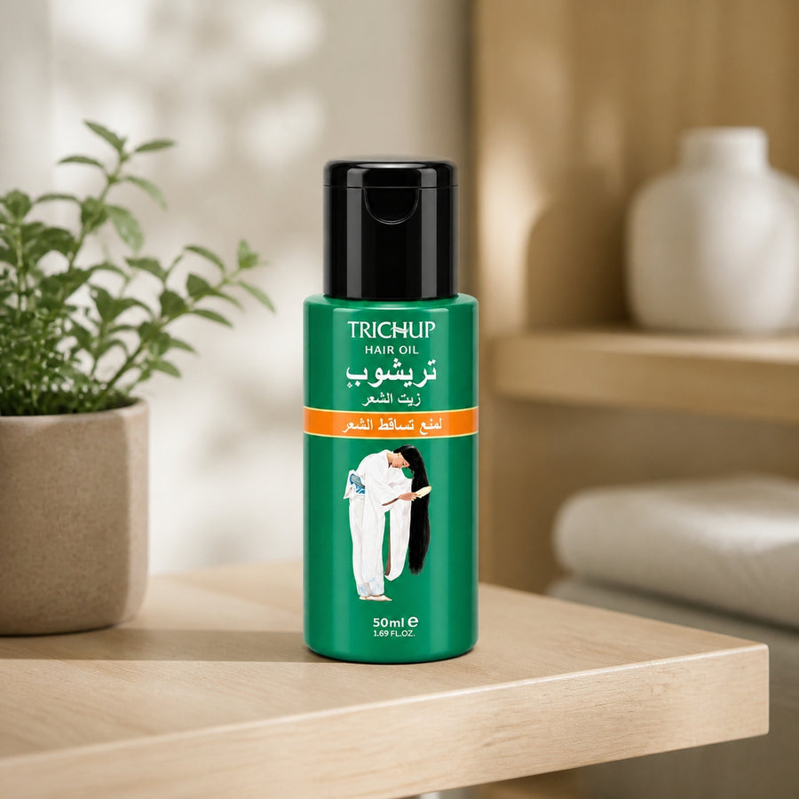Huile Anti-Chute Soin Indien Trichup 50mL – présentation sur étagère en bois