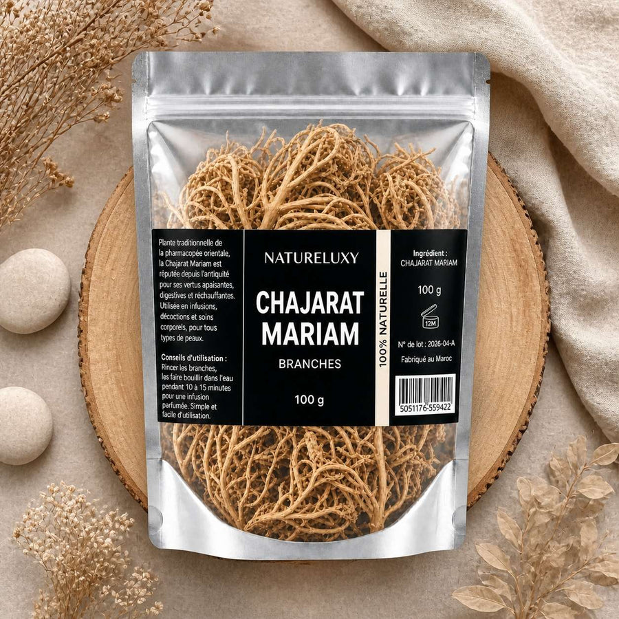 Chajarat Mariam 100g Plante pour La Fertilité des Femmes – composition flat lay avec éléments naturels, vue du dessus