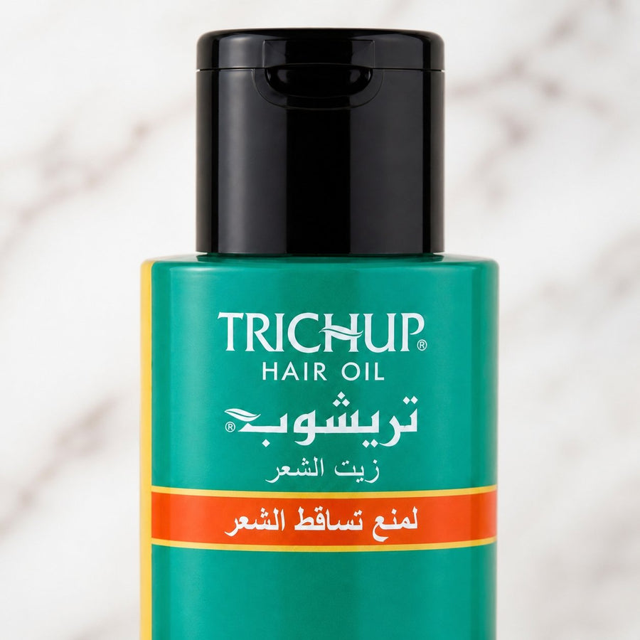 Huile Anti-Chute Soin Indien Trichup - 100mL – gros plan sur les détails et la finition du packaging