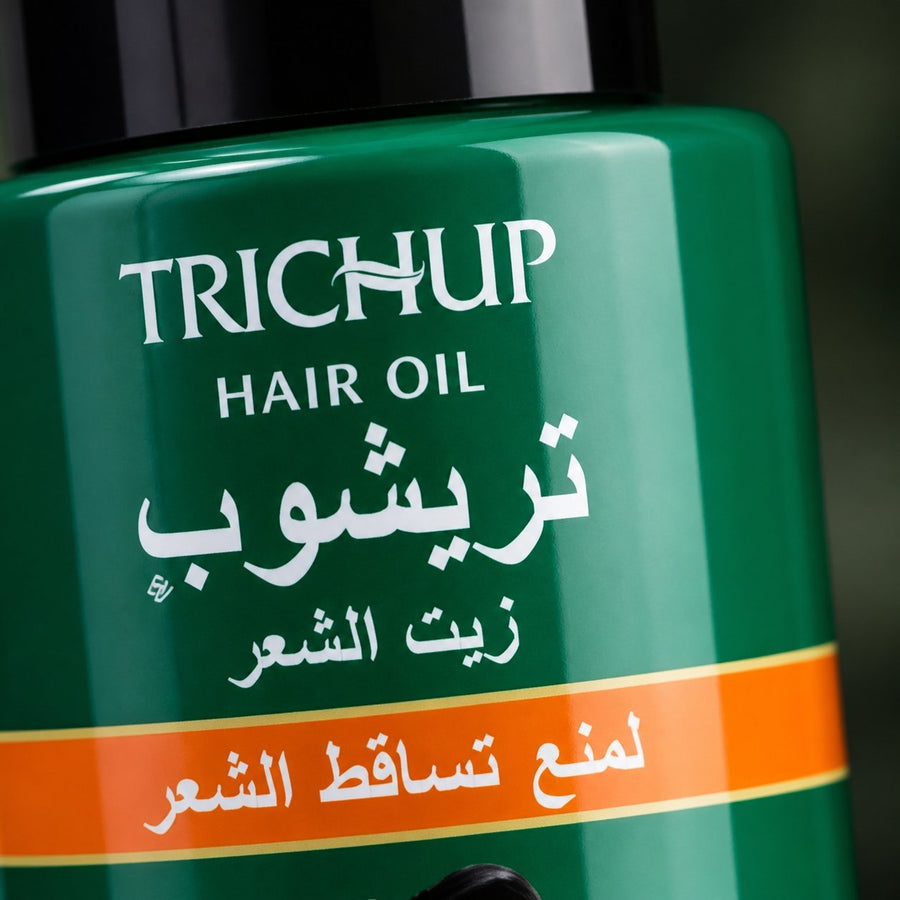 Huile Anti-Chute Soin Indien Trichup 50mL – gros plan sur la texture et la matière