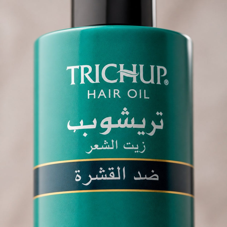 Huile Anti-pelliculaire Soin Indien Trichup 200mL – gros plan sur la texture