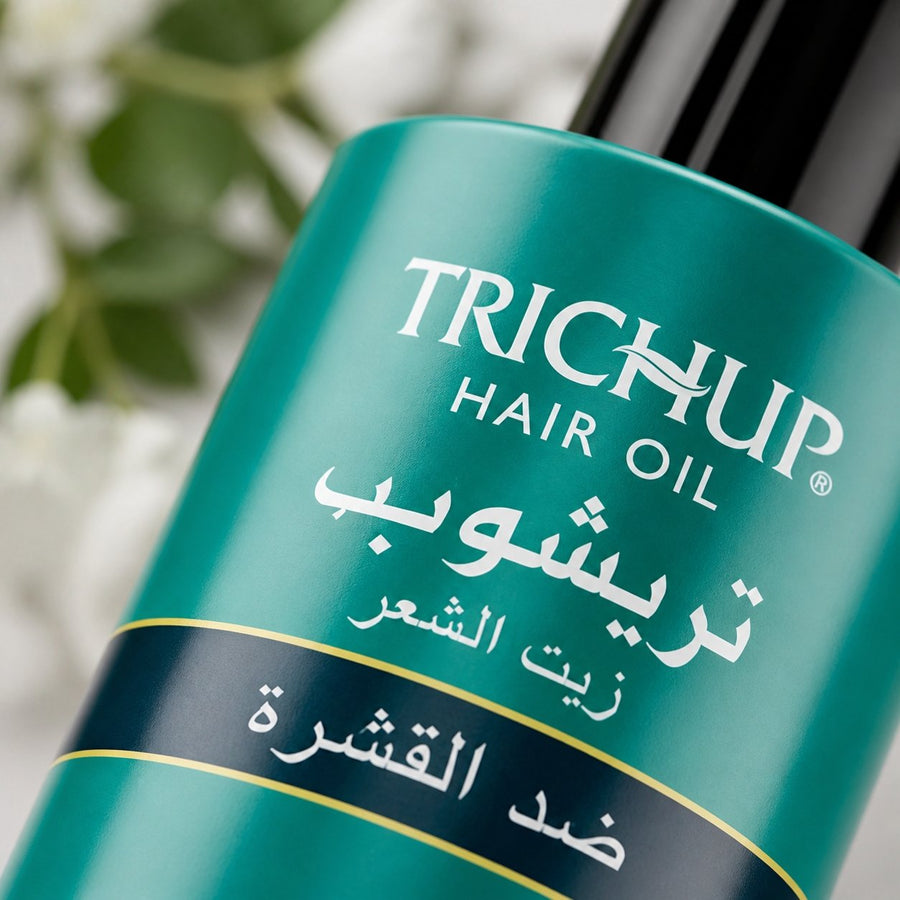 Huile Anti-pelliculaire Soin Indien Trichup 200mL – gros plan sur la texture et la matière