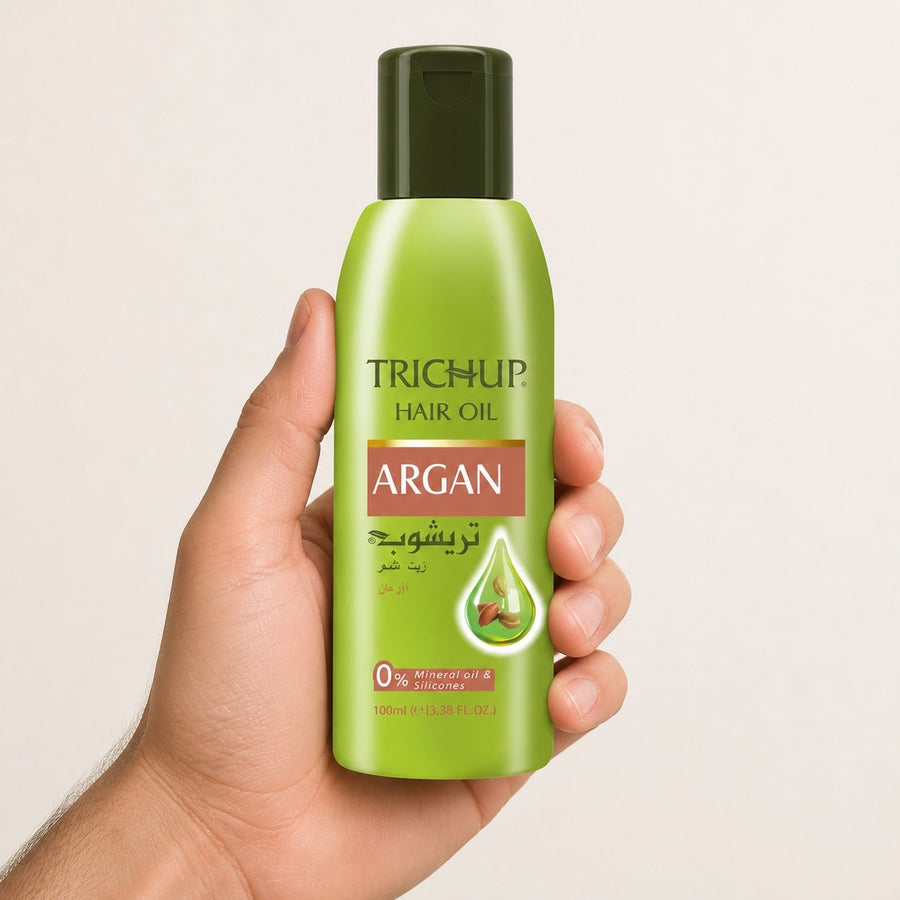Huile capillaire à l'Argan Trichup - 100mL – taille et contenance réelles du produit en main