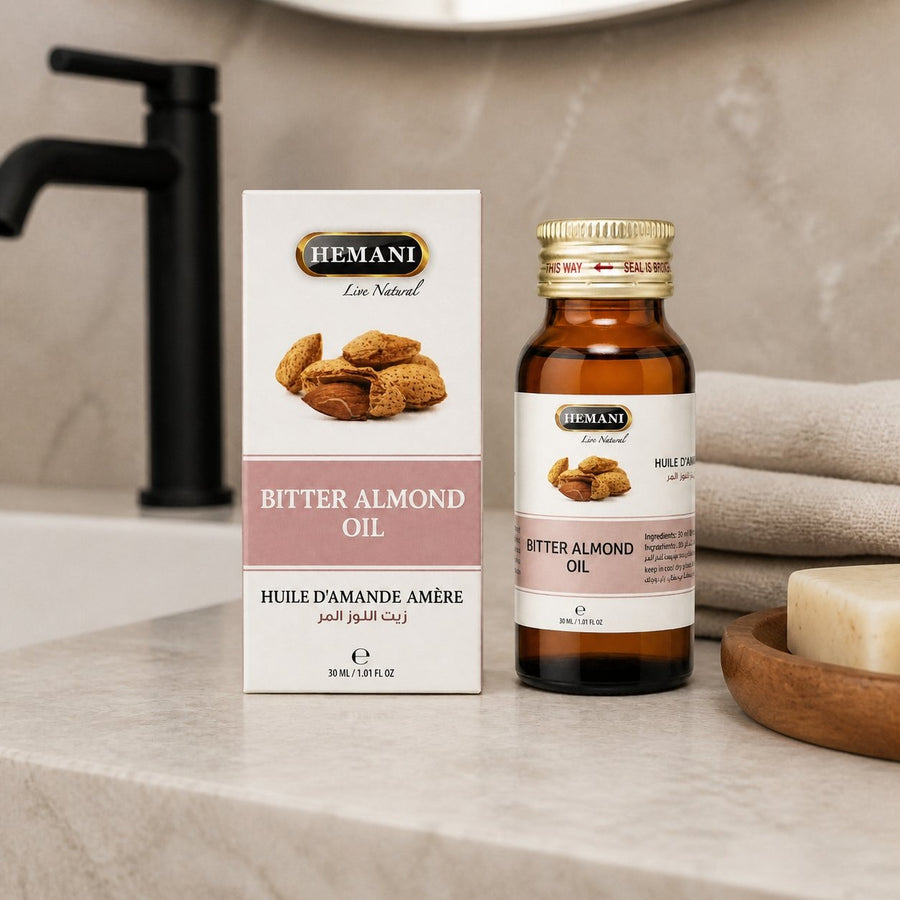 Huile d'Amande Amère 30ml Hemani – présentation du produit dans une salle de bain lumineuse et naturelle