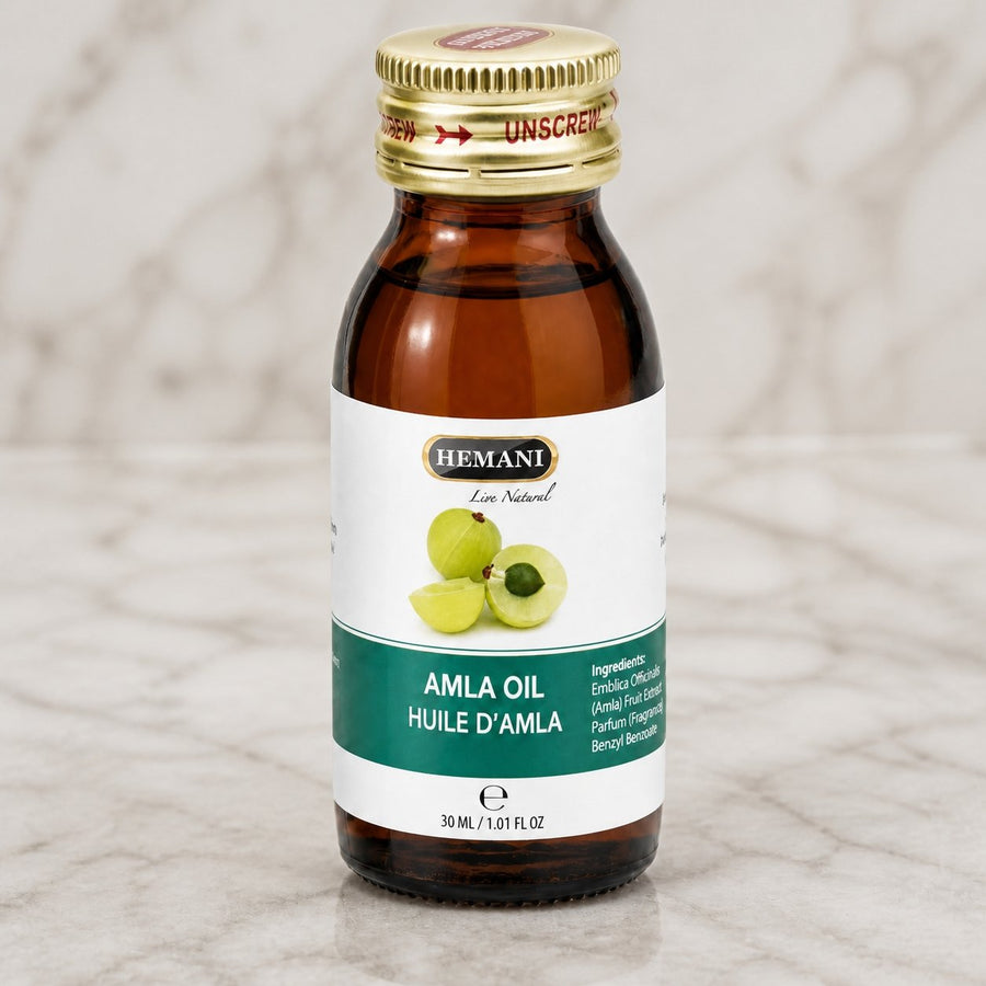 Huile d’Amla Hemani 30 mL – 100% Naturelle – Soin Capillaire – gros plan sur les détails et la finition du packaging