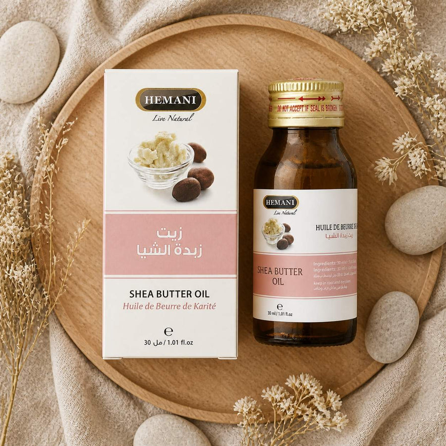 Huile de Beurre de Karité 30ml Hemani Naturel – composition flat lay avec éléments naturels, vue du dessus