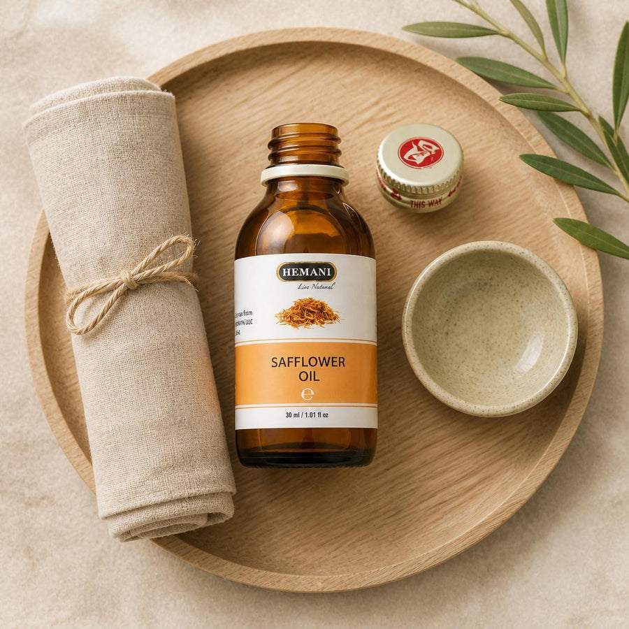 Huile de Carthame 30mL 100% Naturelle Hemani – rituel d'utilisation vu du dessus, ambiance naturelle zen