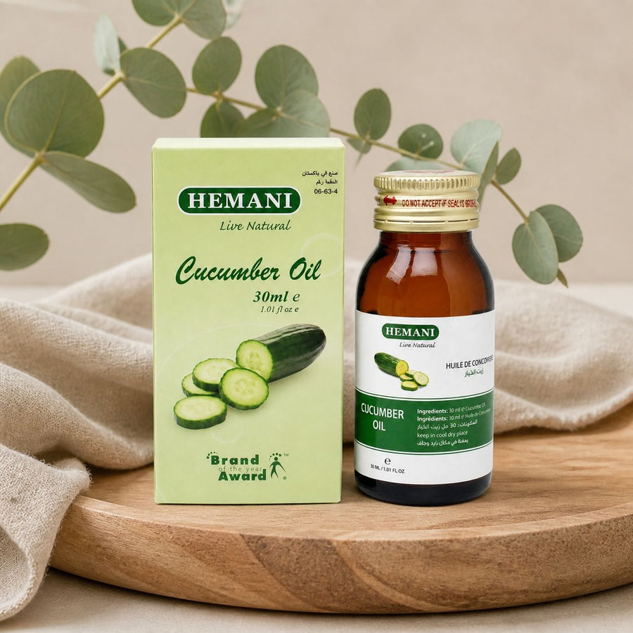 Huile de Concombre 30ml HEMANI – composition sur plateau en bois