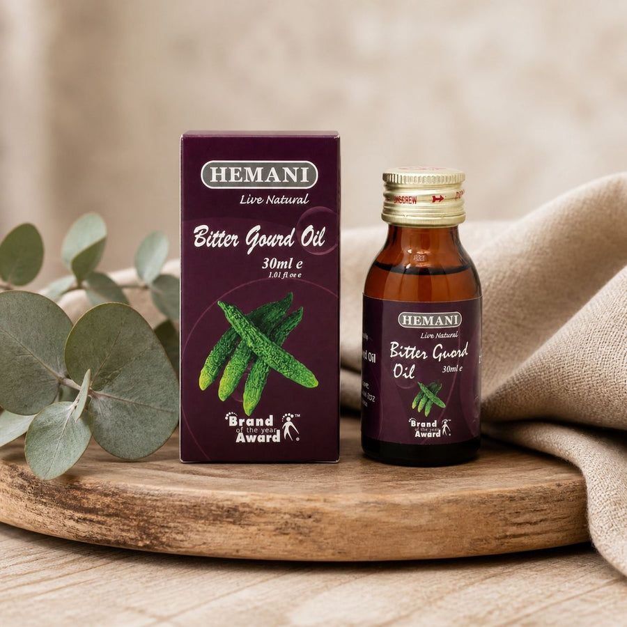 Huile de Courge Amère 30mL 100% Naturelle Hemani – composition sur plateau en bois