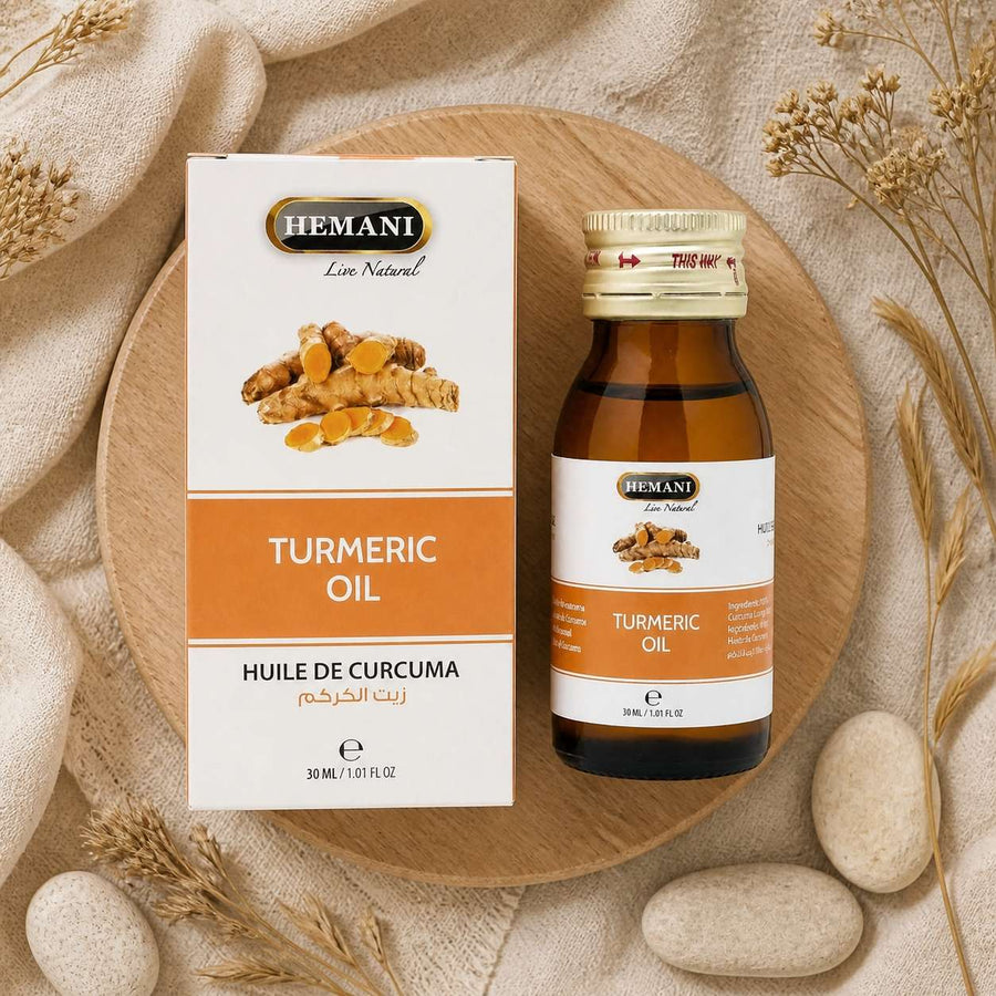 Huile de Curcuma 30mL Hemani 100% naturelle – composition flat lay avec éléments naturels, vue du dessus