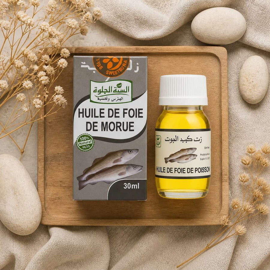 Huile de Foie de Morue 30mL – composition flat lay avec éléments naturels, vue du dessus