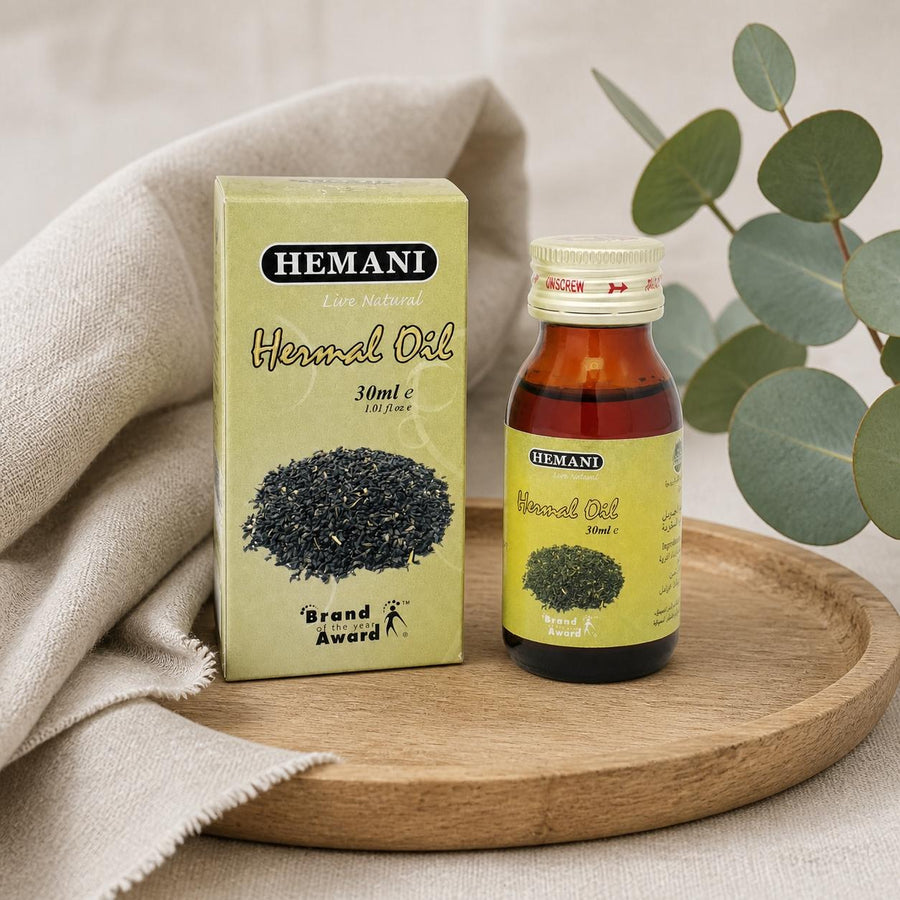 Huile de Harmal 30mL 100% Naturelle Hemani – composition sur plateau en bois