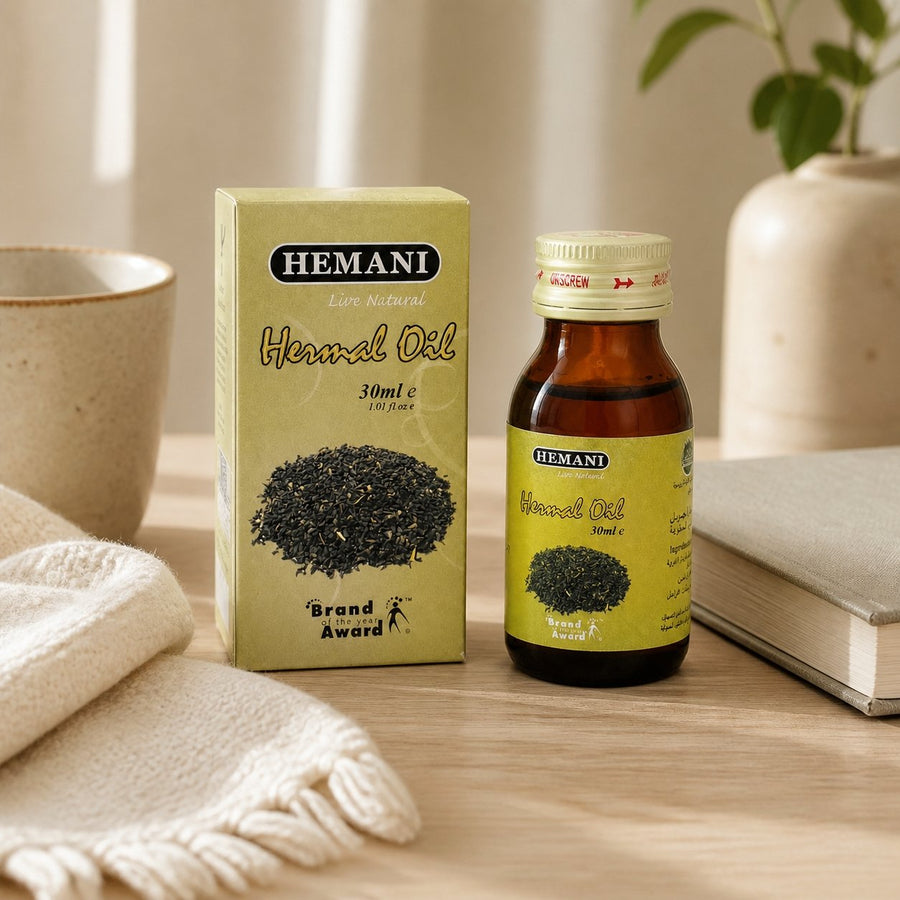 Huile de Harmal 30mL 100% Naturelle Hemani – présentation avec objets du quotidien