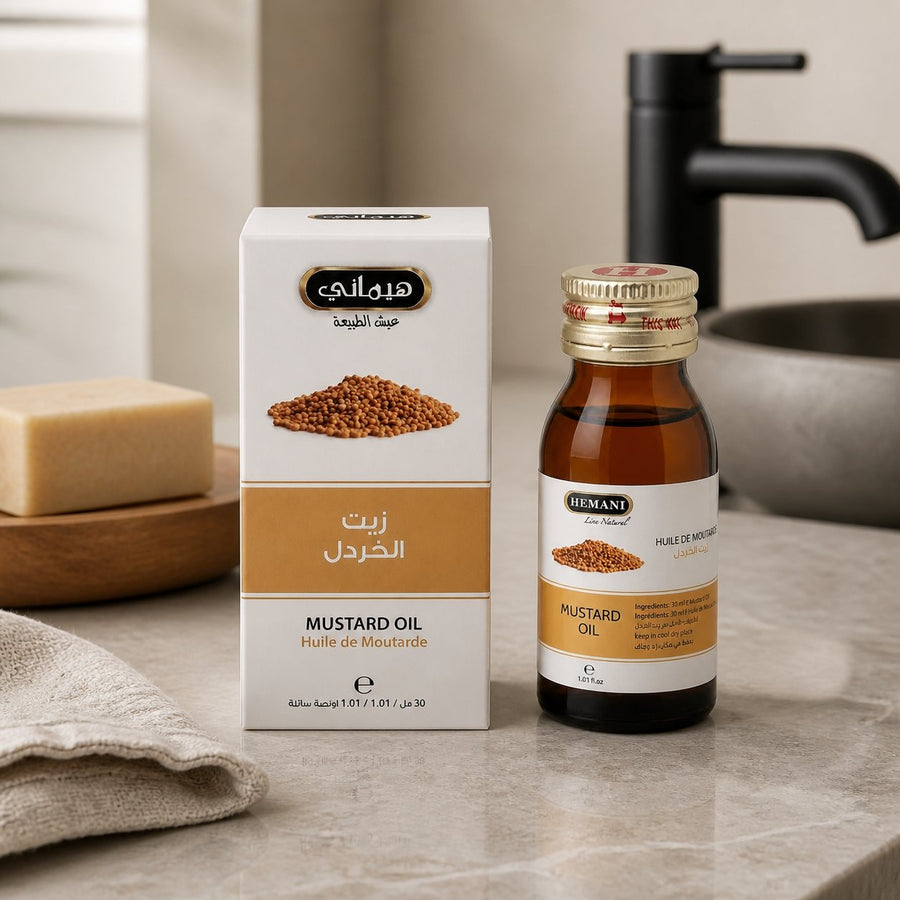 Huile de Moutarde 30ml HEMANI – présentation du produit dans une salle de bain lumineuse et naturelle