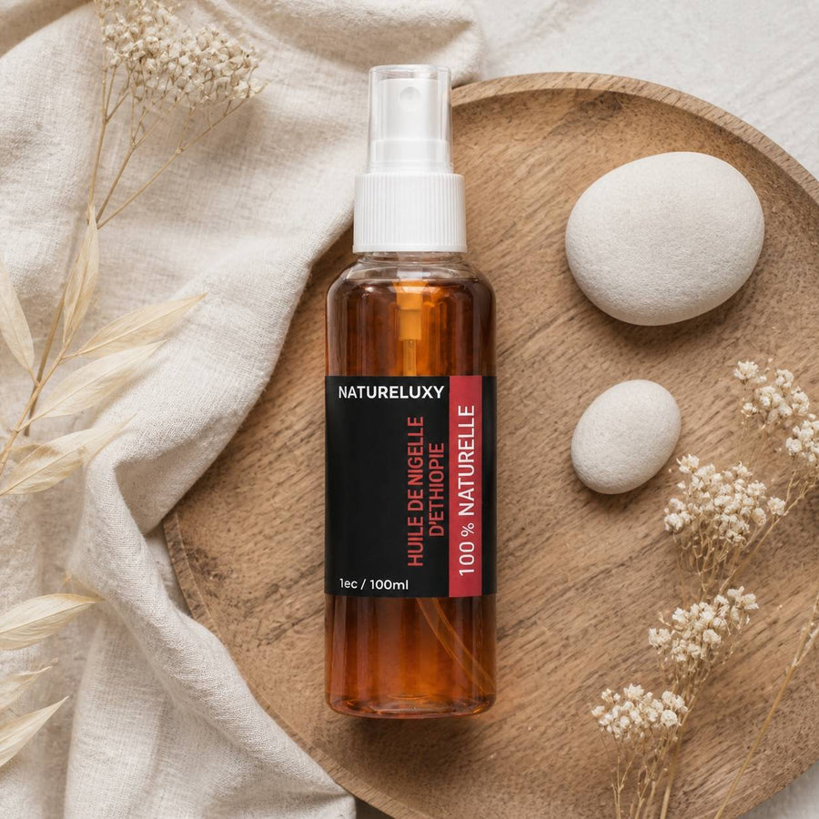 Huile de Nigelle d'Ethiopie 100mL spray 100% Naturel – composition flat lay avec éléments naturels, vue du dessus