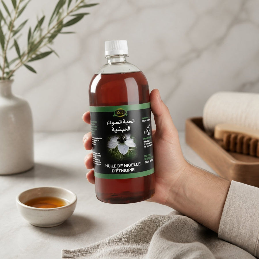 Huile de Nigelle d’Éthiopie Haute Qualité 1L – Pressée à froid – Non filtrée – Cosmétique & Comestible (Habashia) – application en situation réelle, geste de soin quotidien