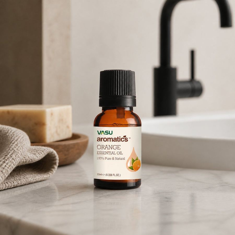 Huile essentiel d'Orange 10mL - Aromatics – présentation du produit dans une salle de bain lumineuse et naturelle