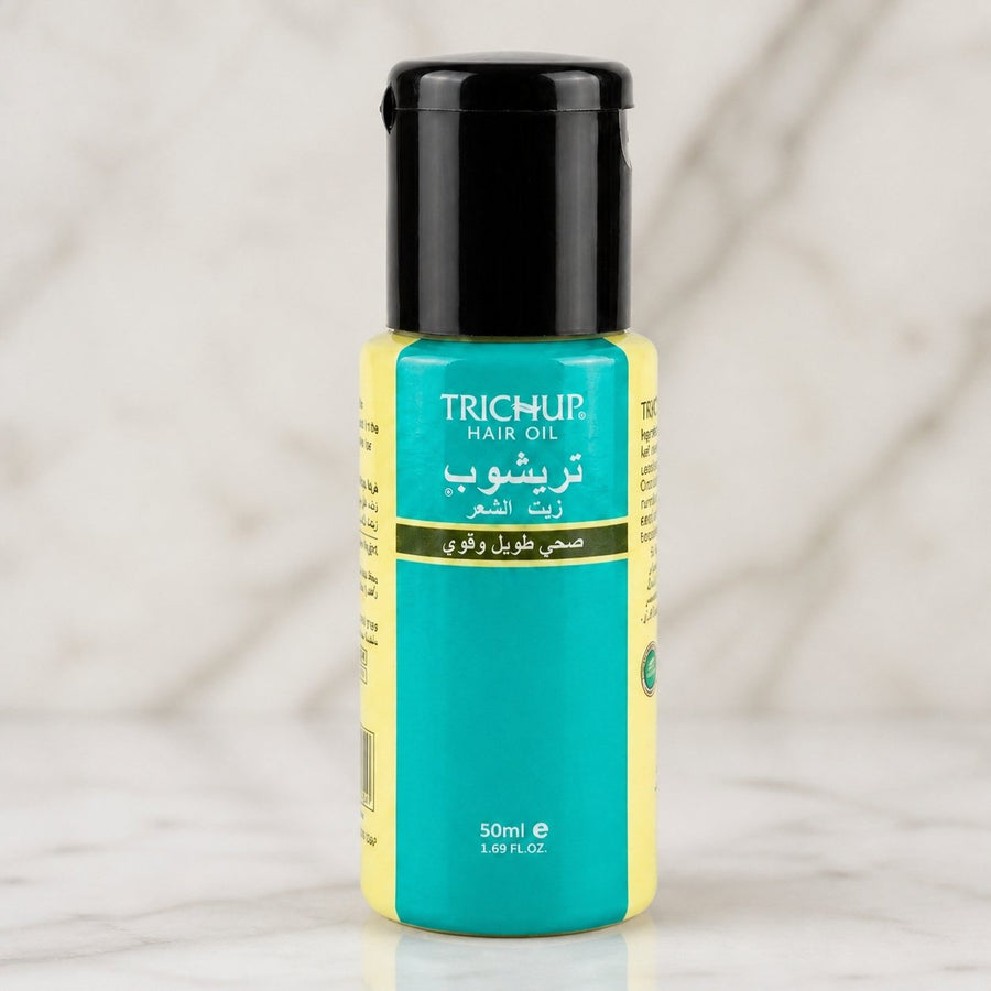 Huile pour Pousser les Cheveux Rapidement - Trichup Indienne 50ml – gros plan sur les détails et la finition du packaging