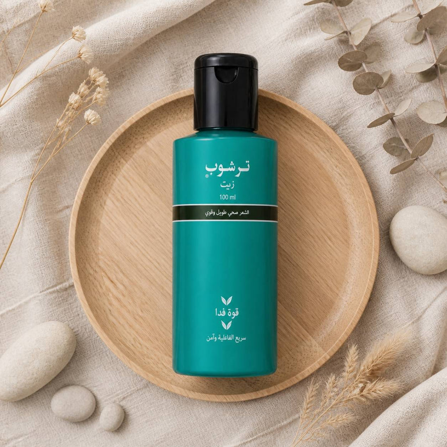 Lot de 2 Huiles Capillaires pour la Pousse des Cheveux Trichup - 2 x 100 mL – composition flat lay avec éléments naturels, vue du dessus