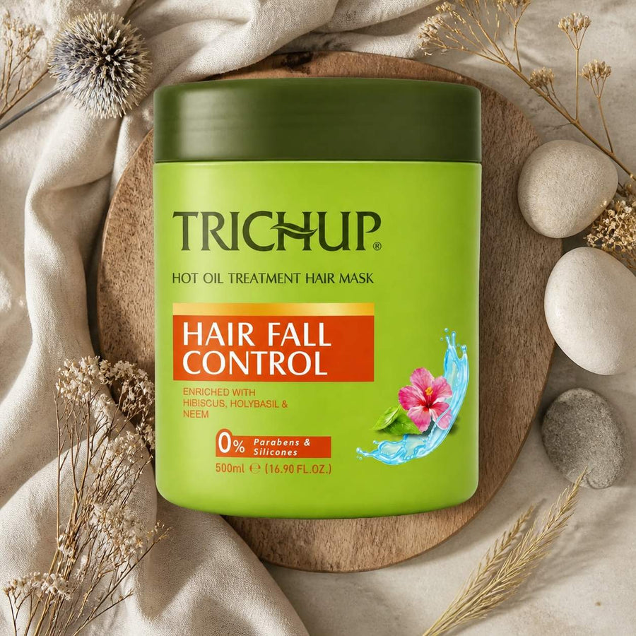 Masque Capillaire Anti-chute 500mL Trichup – composition flat lay avec éléments naturels, vue du dessus