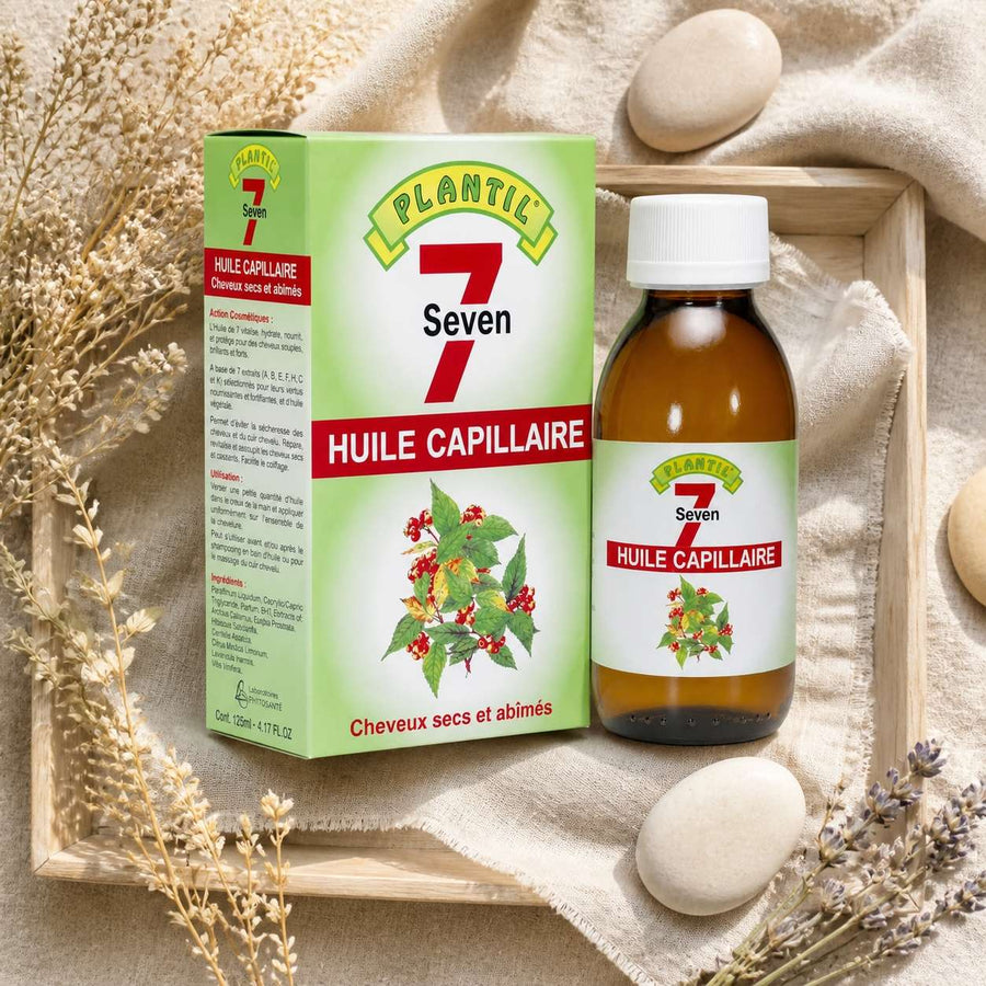Mélange de 7 Huiles pour cheveux secs et abimés Plantil 125ml – composition flat lay avec éléments naturels, vue du dessus