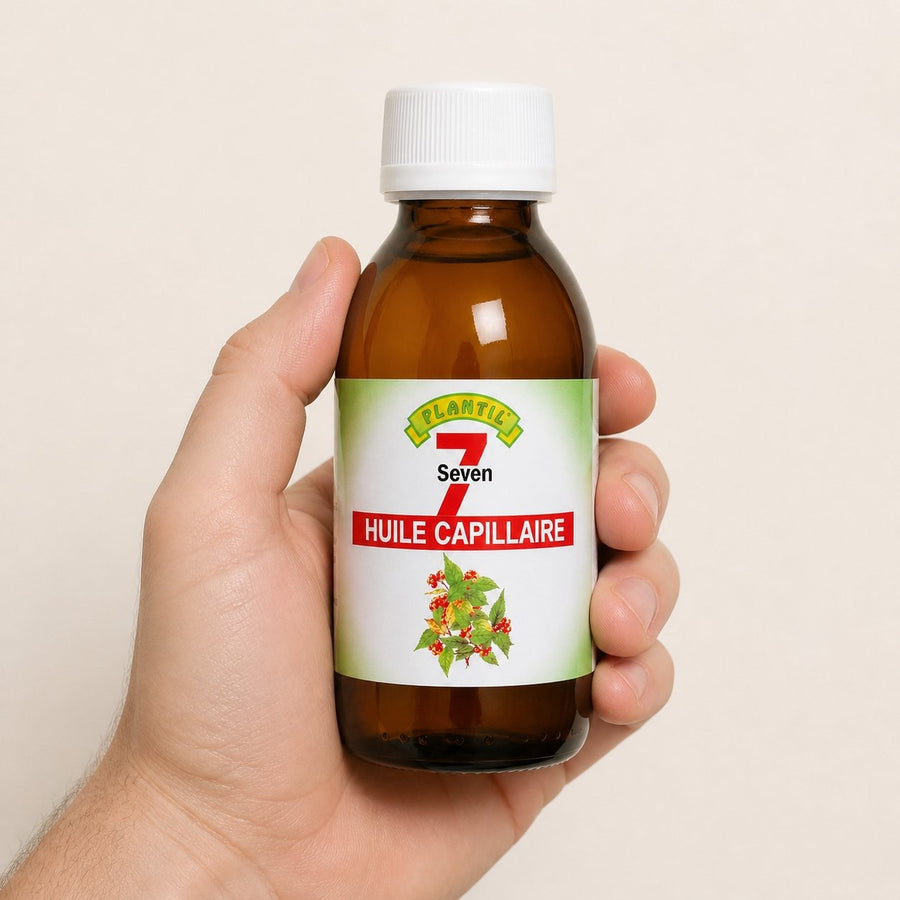 Mélange de 7 Huiles pour cheveux secs et abimés Plantil 125ml – taille et contenance réelles du produit en main