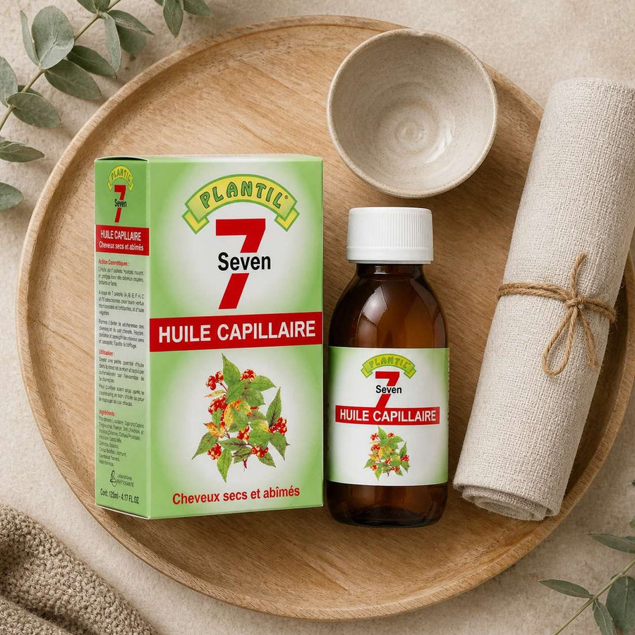 Mélange de 7 Huiles pour cheveux secs et abimés Plantil 125ml – rituel d'utilisation vu du dessus, ambiance naturelle zen