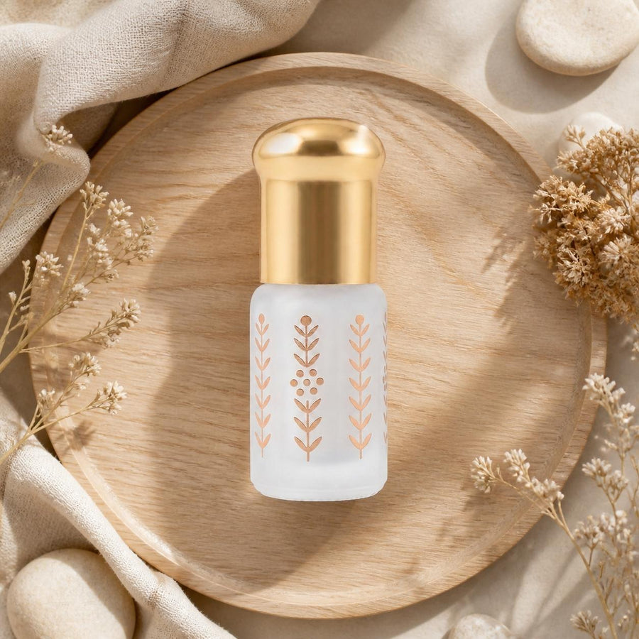 Musc Tahara Pastèque 3 mL - Musc Blanc Parfumé – composition flat lay avec éléments naturels, vue du dessus